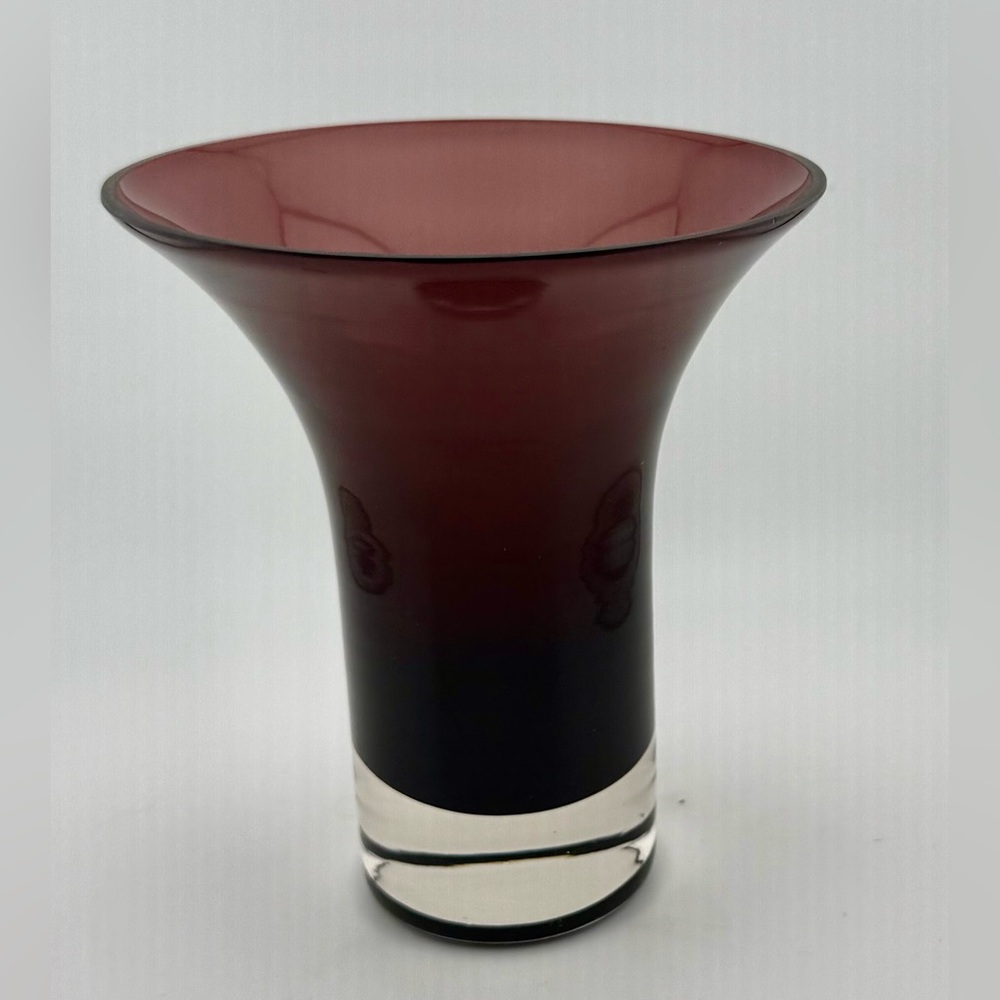Venetian Murano style amethyst purple art glass vase with a clear base.